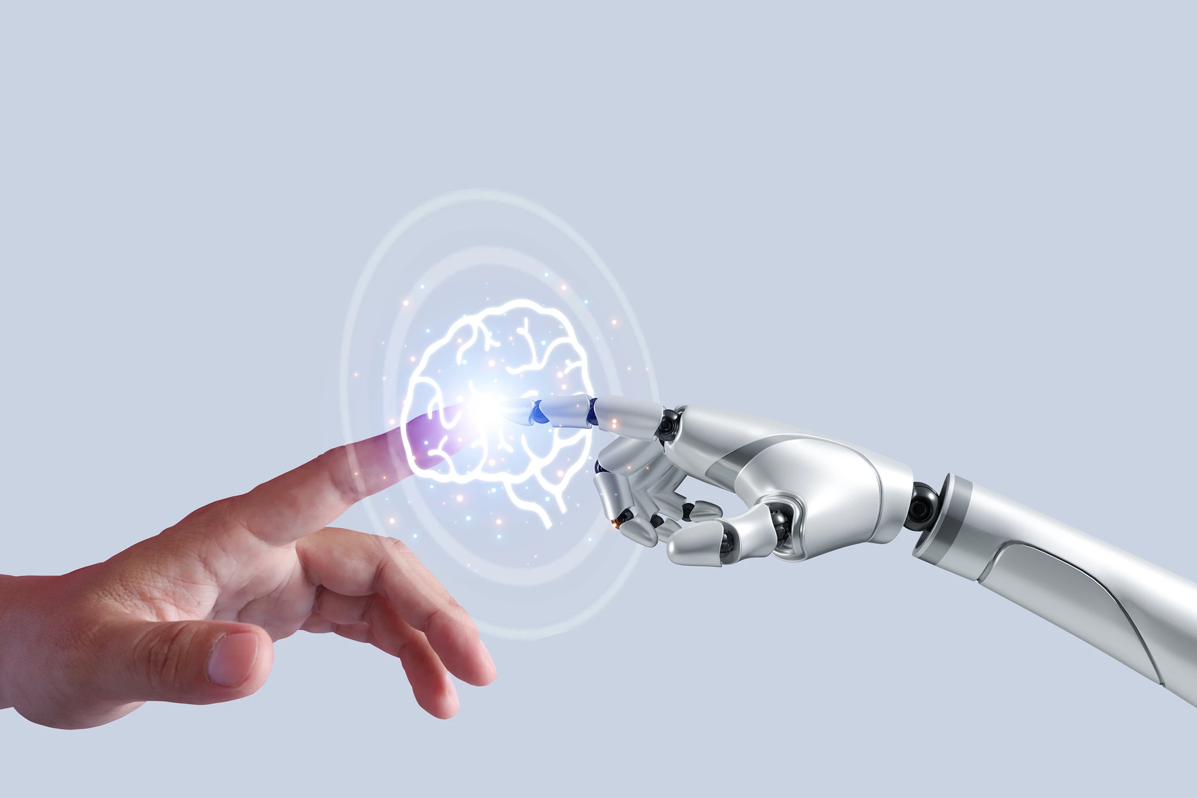 Eine menschliche und eine Roboterhand berühren sich